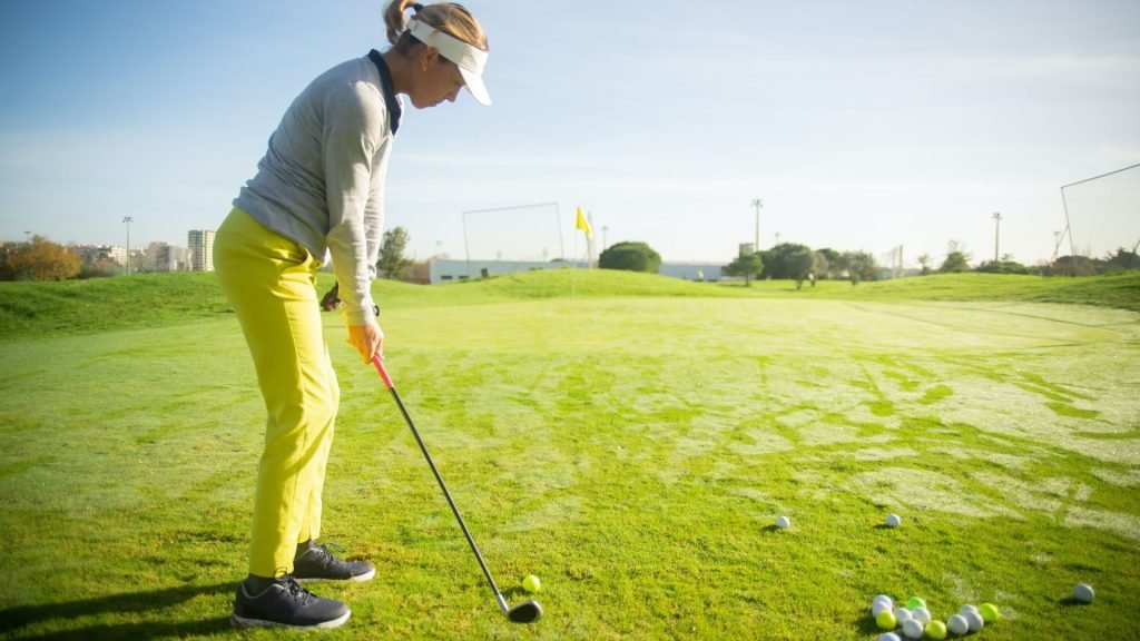 woman golfer gets ready to hit her shot